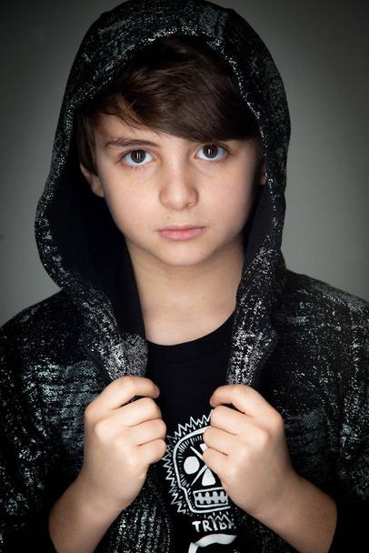 model kid boy close up portrait on dark background - Photo, Image