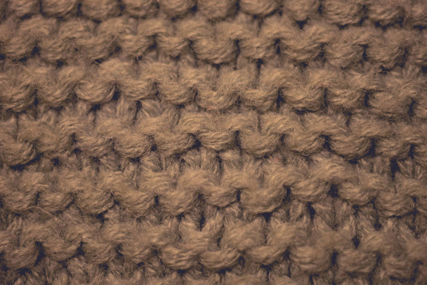 Knitted texture, brown thread pattern, knitting background. - Photo, Image