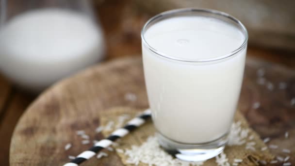 Glass of Rice Milk as detailed close-up shot, selective focus - Video
