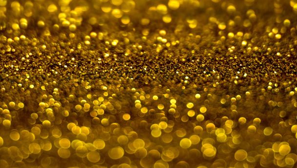 Golden shiny background, gold sparkles abstract background. - Photo, Image