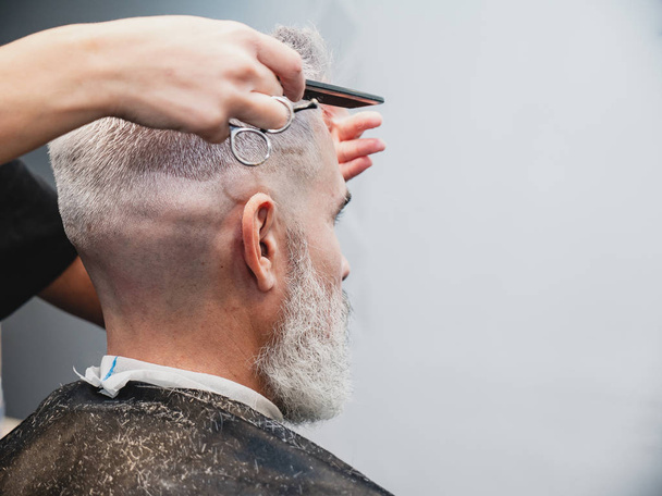 man having his hair done - Photo, Image