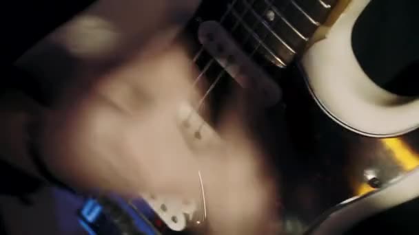 Playing electric guitar in a club - Felvétel, videó