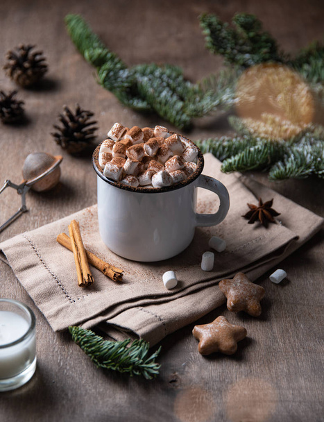  cup of cocoa and marshmallow with gingerbread and cinnamon  - Photo, Image