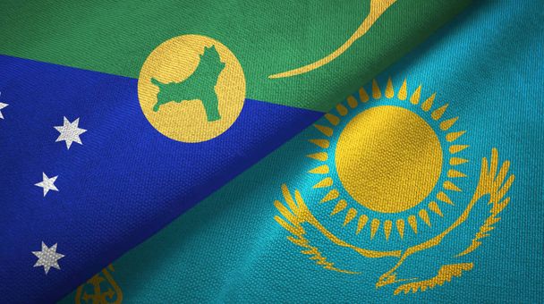 Weihnachtsinsel und Kasachstan zwei Flaggen Textilstoff, Textur - Foto, Bild