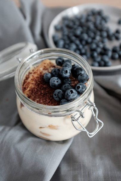 Pudding with cinamon and blueberries - Φωτογραφία, εικόνα