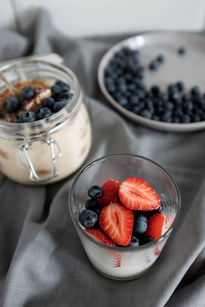 Healthy breakfast with yoghurt and ripe berries - Photo, Image