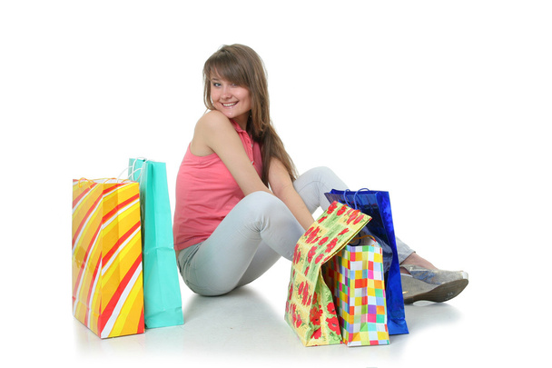 The beautiful girl with purchases - Fotografie, Obrázek