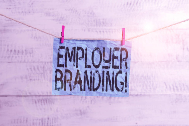 Text sign showing Employer Branding. Conceptual photo promoting company employer choice to desired target group Clothesline clothespin rectangle shaped paper reminder white wood desk. - Photo, Image