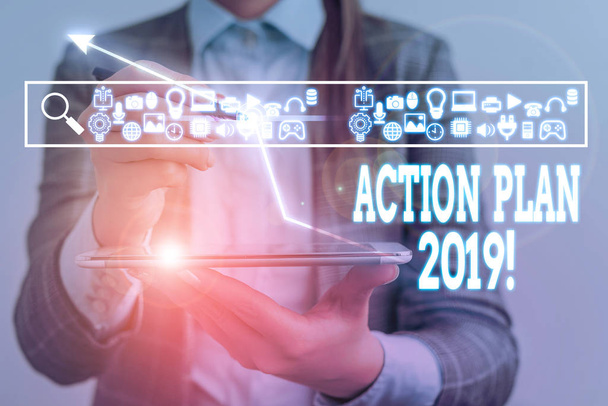 Conceptual hand writing showing Action Plan 2019. Business photo showcasing proposed strategy or course of actions for current year. - Photo, Image