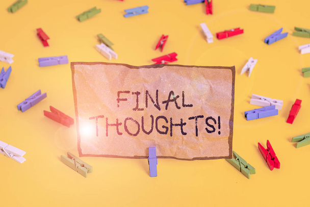 Handwriting text writing Final Thoughts. Concept meaning should be last few sentences within your conclusions Colored clothespin papers empty reminder yellow floor background office. - Photo, Image