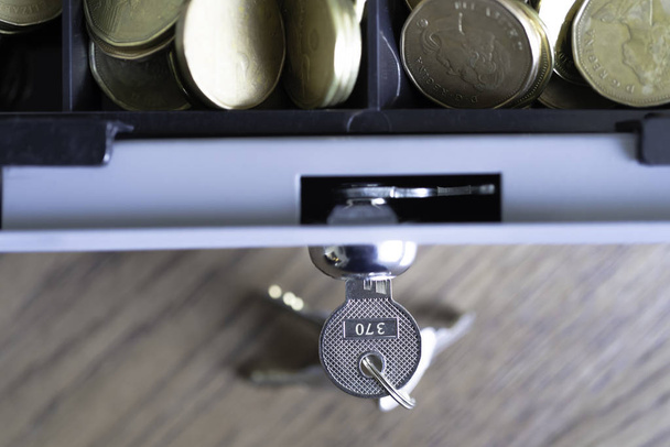 Cashbox lock with keys and full of Coins - Photo, Image