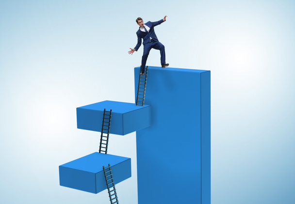 Businessman falling from high block in failure concept - Photo, Image