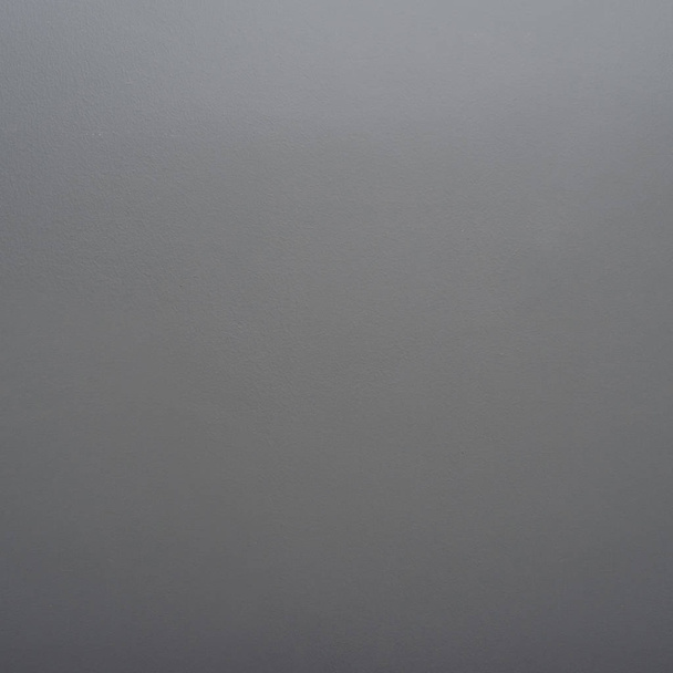 Γκρι τσιμεντένια υφή τοίχου φόντο. Σκούρο γκρι σχεδιασμένο grunge - Φωτογραφία, εικόνα