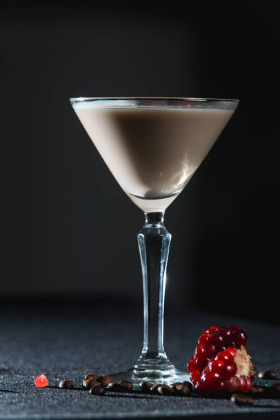 Espresso Martini cocktail, grains of pomegranate on top - Zdjęcie, obraz