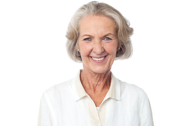 Portrait of a smiling senior woman - Foto, afbeelding