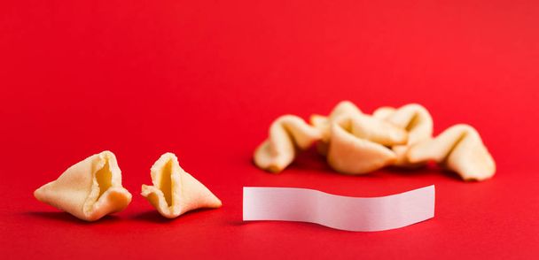 Traditional Chinese new year fortune cookies on red background - Foto, Imagem