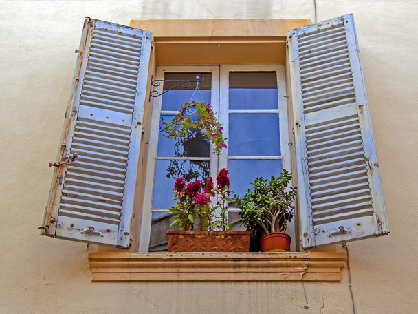 France, Cote d'Azur, in October 2013. Typical architectural details of the old French town of Antibes - Fotó, kép
