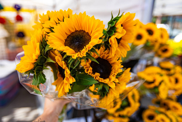 Vibrant flowers at outdoor farmers market - Photo, Image