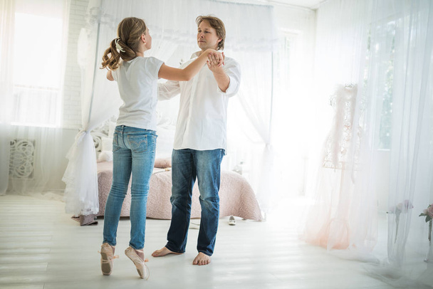 Dad is dancing with his teenage daughter - Zdjęcie, obraz