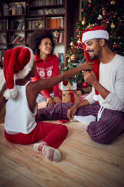 Family Celebrating Christmas Together.father play with his  daughter - Foto, Imagem