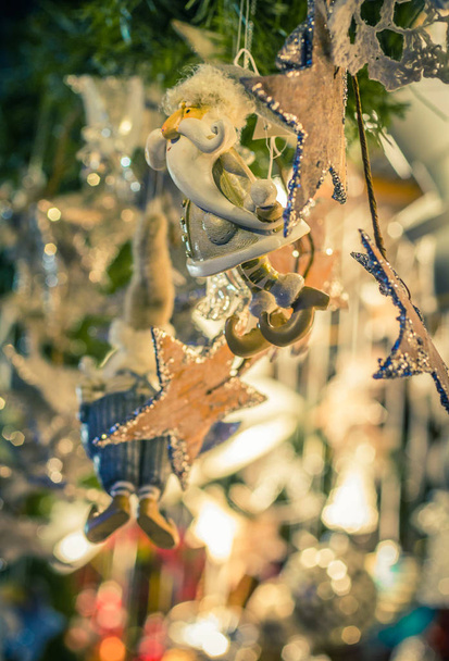 Christmas fir tree with Christmas decoration and glitters - Fotó, kép