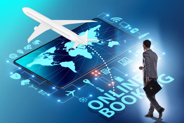 Concept of online airtravel booking with businessman - Photo, Image