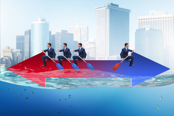 Disagreement concept with businessmen rowing in different direct - Photo, Image