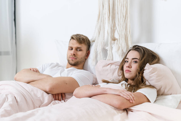 Young adult girl and guy spending weekend at home - Photo, Image