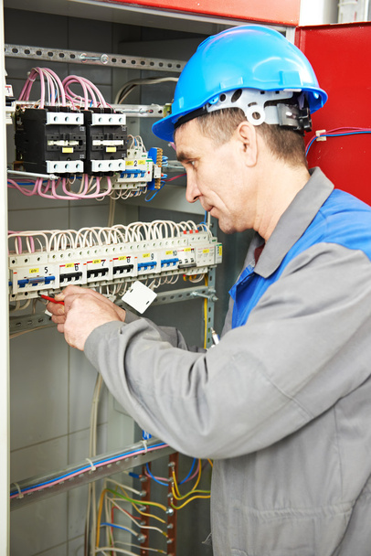 Electrician working at power line box - Zdjęcie, obraz