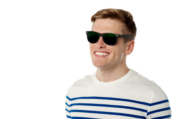 Stylish young guy in black sunglasses - Foto, Bild