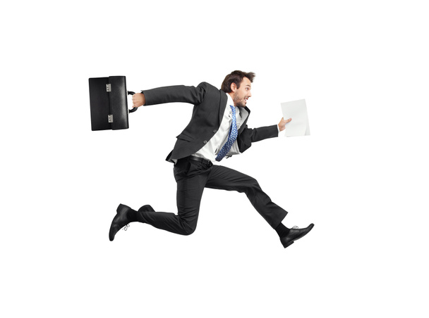 Businessman running with a briefcase - Zdjęcie, obraz
