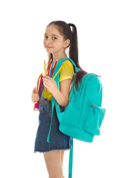 Little girl with school stationery on white background - Φωτογραφία, εικόνα