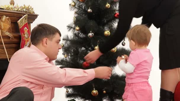 Decorating Christmas tree on Christmas Eve. - Footage, Video