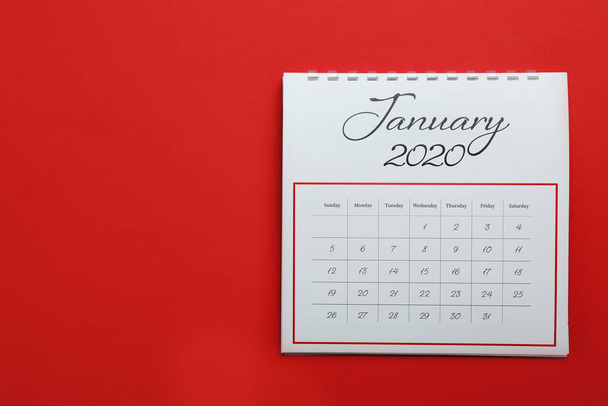 January 2020 calendar on red background, top view. Space for text - Foto, Imagen