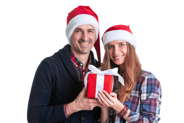 Couple with christmas gift - Zdjęcie, obraz
