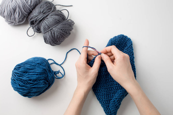 Knitting. Hand Crochet. Female Hand Knit Hook. Top View. - Fotografie, Obrázek