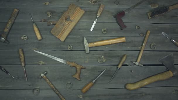 A variety of electro and hand tools and special clothing. Top view.On the table are tools for various types of construction and repair work on wood, metal, concrete, plastic and other materials. - Footage, Video