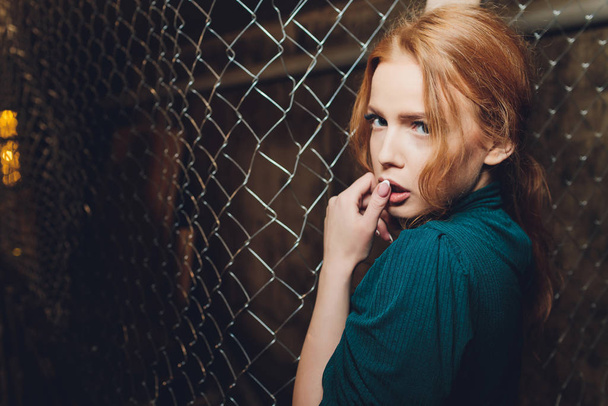 portrait of a young beautiful freckled redhead. - Fotó, kép