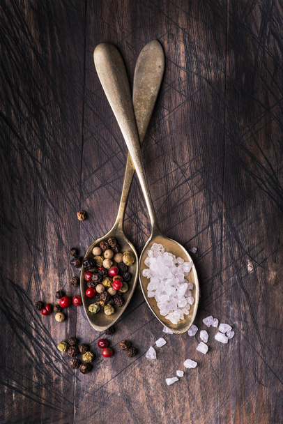 salt and pepper in spoons - Fotoğraf, Görsel
