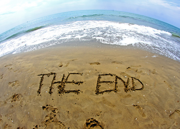 Fantasy writing THE END on the sea beach
 - Фото, изображение