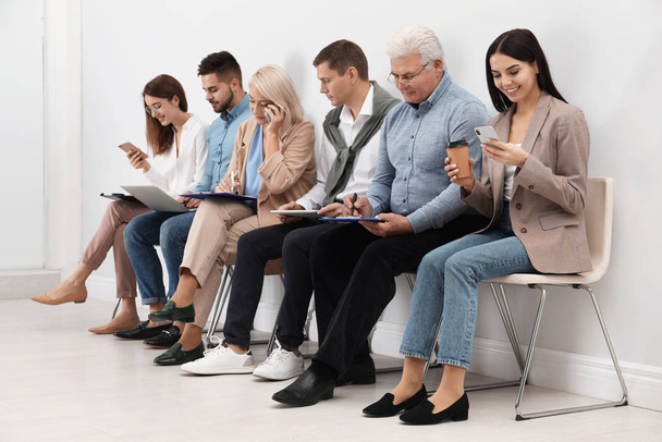 People waiting for job interview in office - Foto, Bild