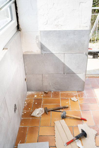 ceramic tile installation site with its tools - Fotó, kép