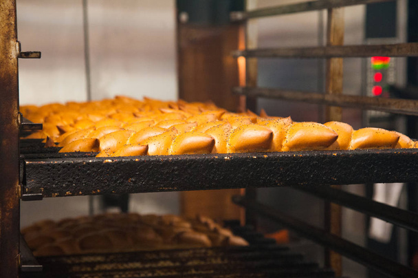 Panadería. Producción de pan, panecillos, pasteles y galletas
 - Foto, Imagen
