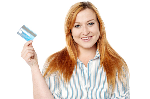 Young lady displaying her cash card - Zdjęcie, obraz