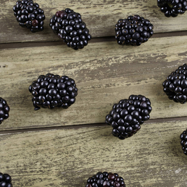 Fresh blackberry on wooden background - Photo, image