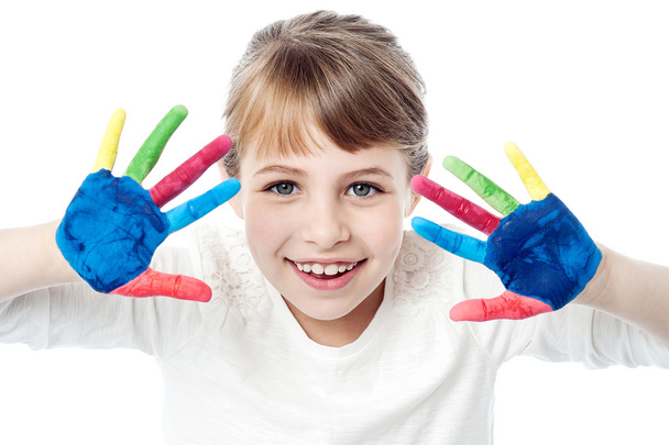 Pretty girl with painted hands - Фото, изображение