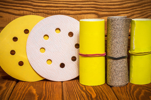 Set of abrasive tools and sandpaper on vintage wooden background - Photo, Image