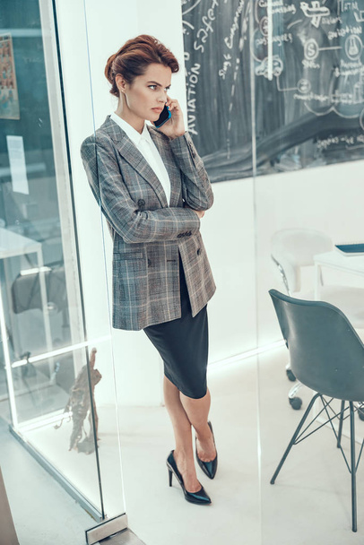 Disappointing phone talk in office stock photo - Photo, image