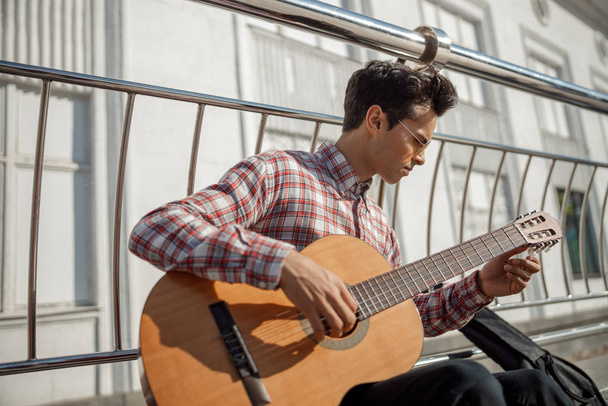 Male musician is enjoying a sunny day - Photo, image
