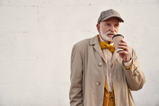 Calm old man with cup of coffee stock photo - 写真・画像